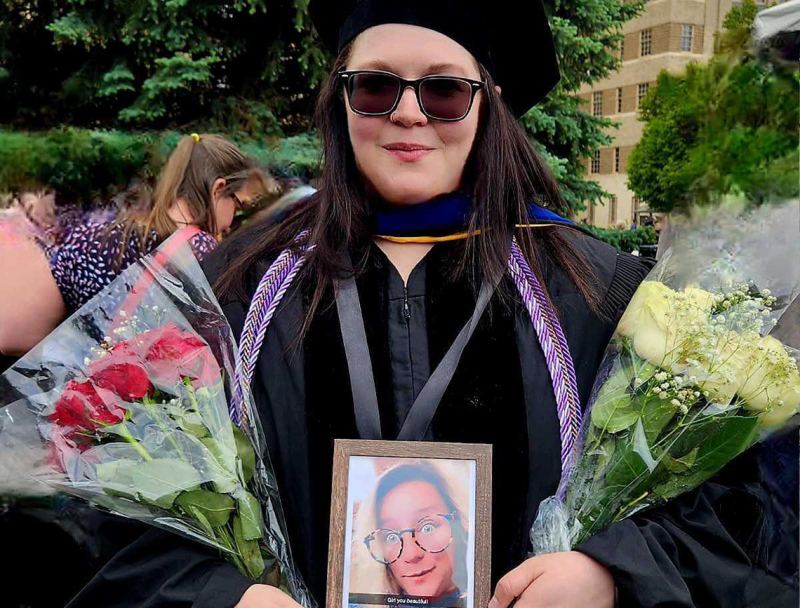 Photo of Dr. Desiree earning her phd at graduation