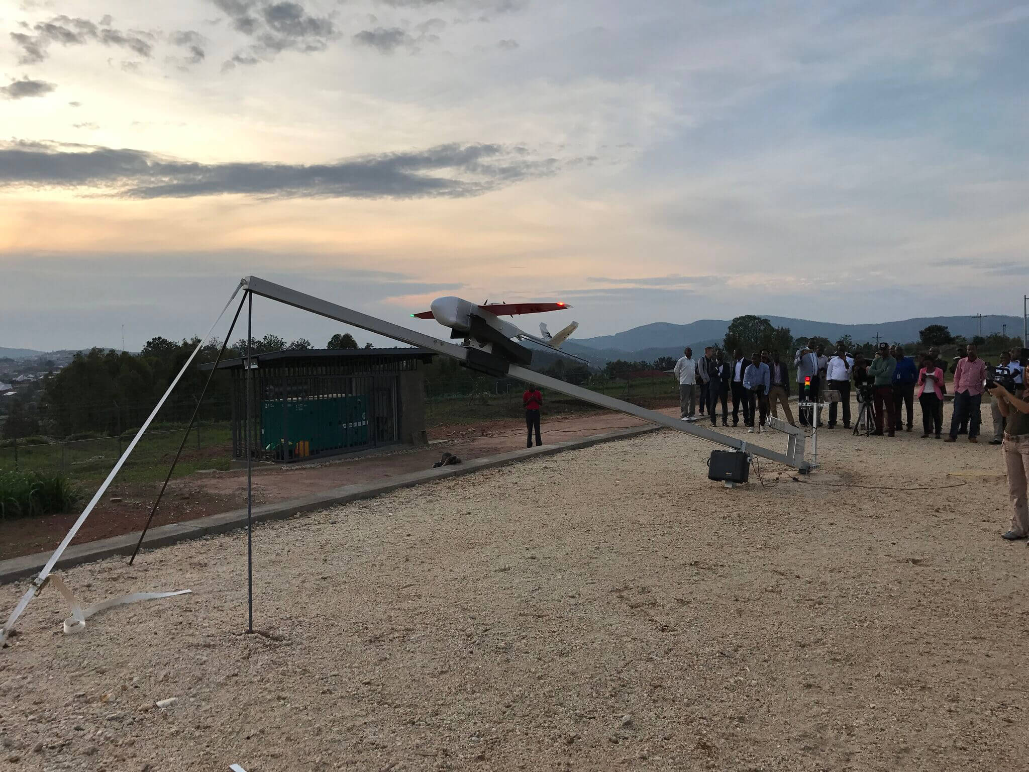 drone launch rwanda sunset