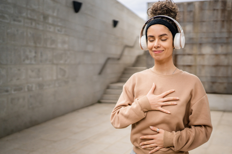 photo of woman using mindful breathing