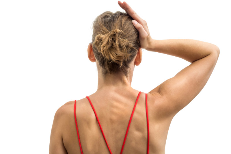 photo of woman doing neck isometrics