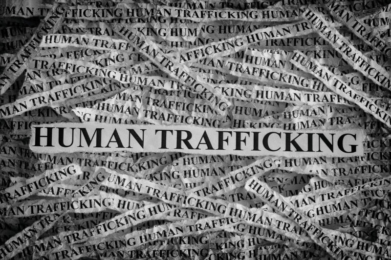 word collage of human trafficking