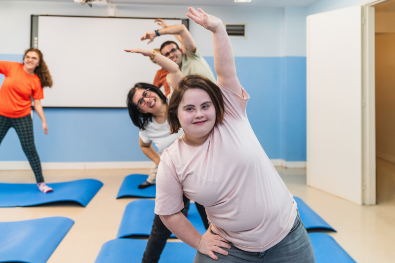 photo of woman with down syndrome in exercise class